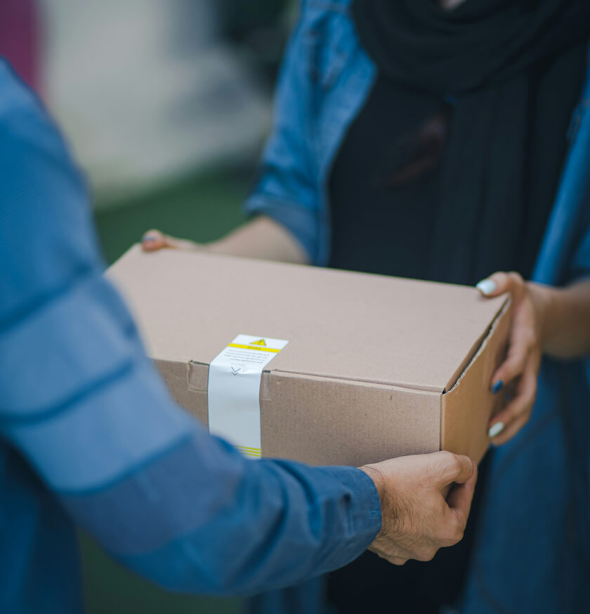 Person receiving delivery package